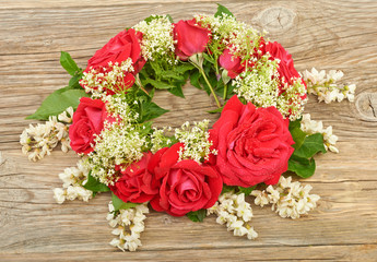 Bouquet wreath of roses and spring flowers