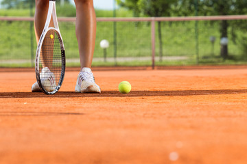 Fototapeta na wymiar Legs of female tennis player.Close up image.