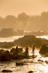 Early morning wash at river.