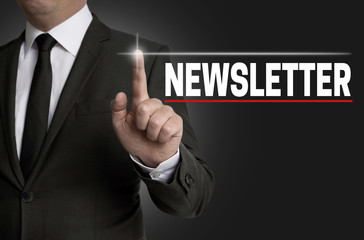 Newsletter touchscreen is operated by businessman