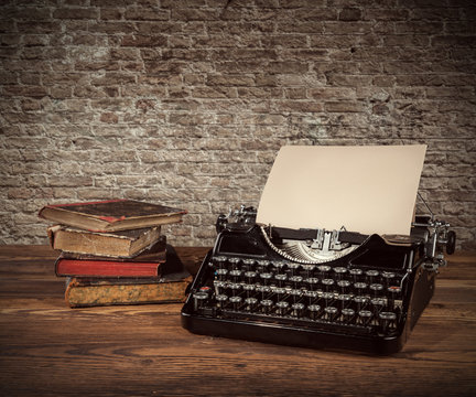 Vintage typewriter on wooden table