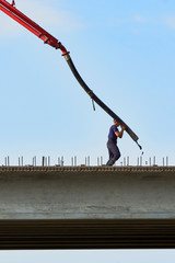 Road works on the construction of the bridge