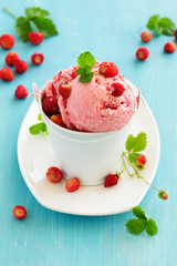 Homemade ice cream with wild strawberry.