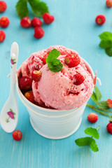 Homemade ice cream with wild strawberry.