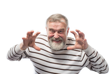Angry old man with a beard scares