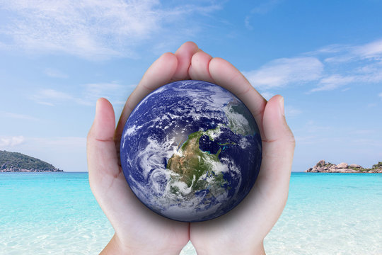 the planet among human hands in concept  Healthy oceans  healthy