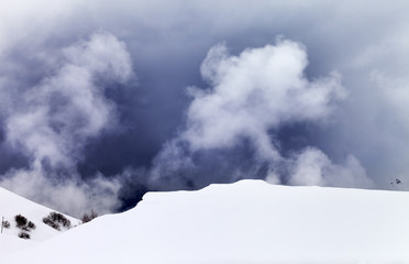 Off-piste slope in fog