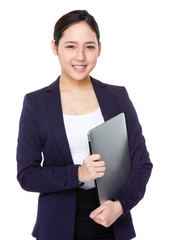 Fototapeta na wymiar Asian businesswoman hold with laptop laptop computer