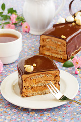 Meringue cake with hazelnut oil dakuazom and chocolate cream. Cake 