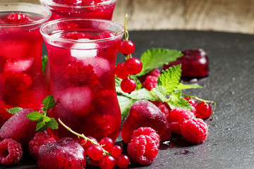 Frozen red tea with raspberries and ice in the authentic Islamic