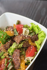 Warm salad with veal