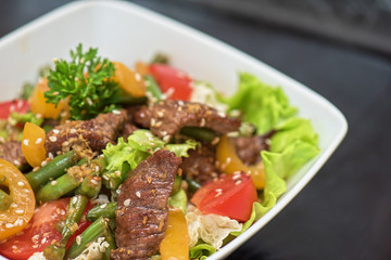 Warm salad with veal