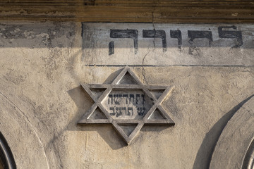  jewish star of David on old building in Cracow , Poland