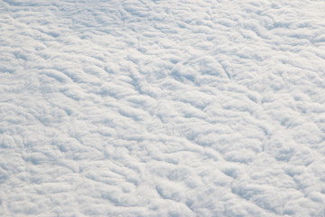 clouds from an airplane as background