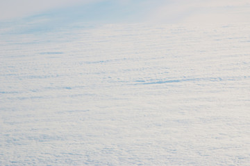 clouds from an airplane as background