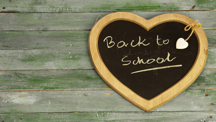 blackboard on wooden table