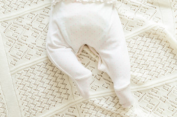 Portrait of cute caucasian little baby girl in backlight