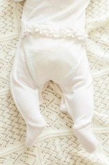 Fototapeta na wymiar Portrait of cute caucasian little baby girl in backlight
