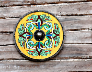 Shield on a wooden wall