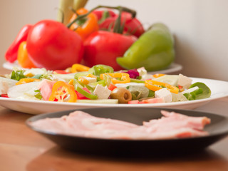 vegetables, ham, Mediterranean salad with lettuce, tomato 0