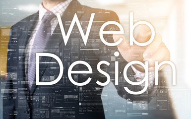 Fototapeta na wymiar the businessman is choosing Web Design from touch screen