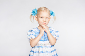 Little girl on a white background