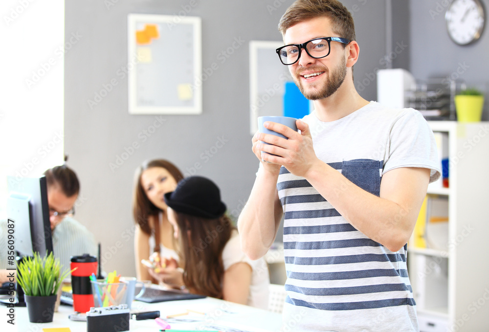 Canvas Prints Image of smart young businessmen looking at camera at meeting