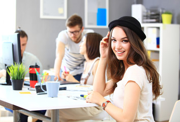 Image of successful businesswoman looking at camera 