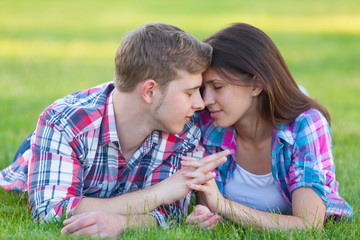 Young teen couple on the green