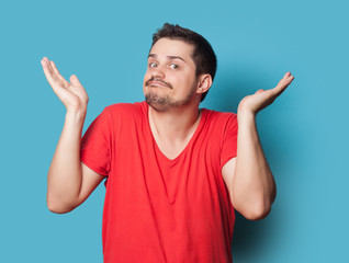 Fototapeta premium young surprised guy in t-shirt