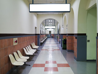 blank billboard in corridor