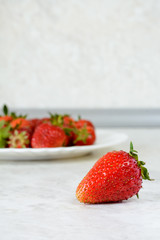 Strawberries on a white plate