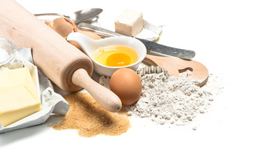 Baking ingredients flour, eggs. Wooden kitchen utensils. Food ba - Powered by Adobe