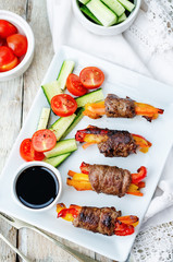 beef stuffed peppers, carrots and onions with balsamic dressing