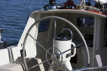 Fotobehang Sailing yacht control wheel and implement witout people. © mauvries