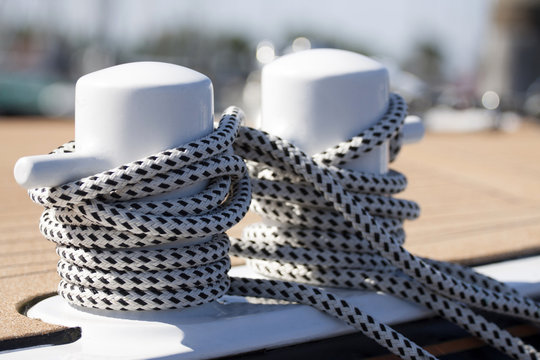 Two winches and rope on a sailboat.