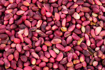 Red peppers being sun dried for sale.
