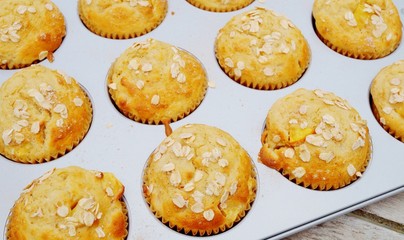 Homemade peach oatmeal muffins in the pan
