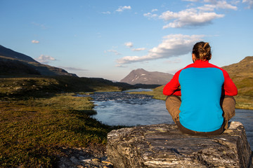 Fototapeta premium relaxing in the evening sun in the wilderness of northern sweden