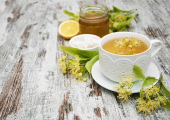 cup of herbal tea with linden flowers