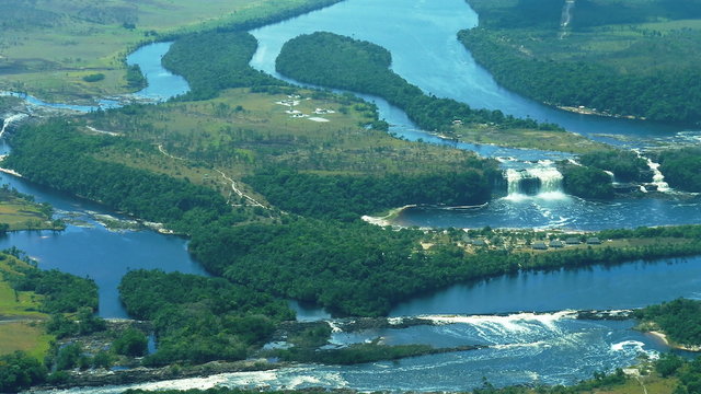 Aerial view of Canaima National Park Lagoon in the flight approaching the airport. Located in Gran Sabana, Bolivar State, Venezuela. Is known place for the beauty of nature and countless waterfalls.
