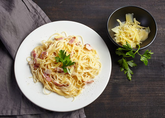 pasta carbonara on white plate