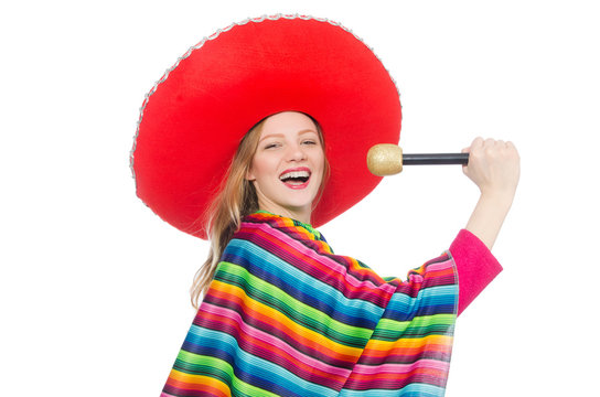 Pretty girl in mexican poncho singing isolated on white