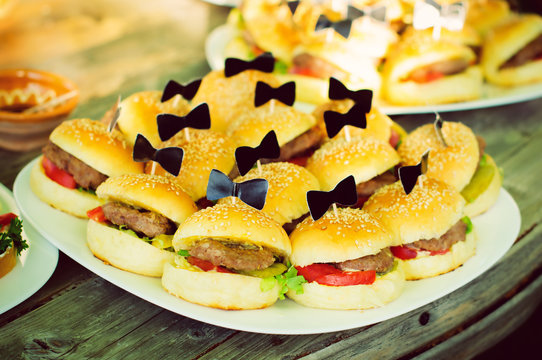Mini hamburgers at catering event
