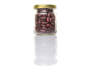 Red kidney beans in mason jar over white background