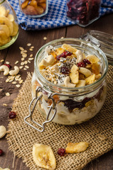Homemade yogurt with granola, dried fruit and nuts bio