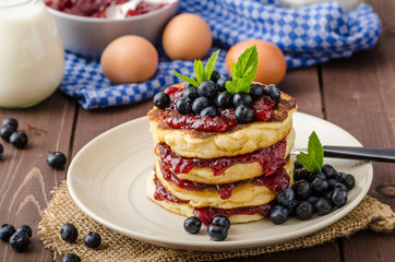 Glutten-free pancakes with jam and blueberries