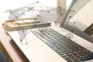  laptop computer is on wooden desk as workplace concept