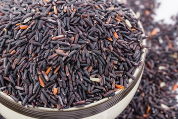 Rice berry in a bowl .