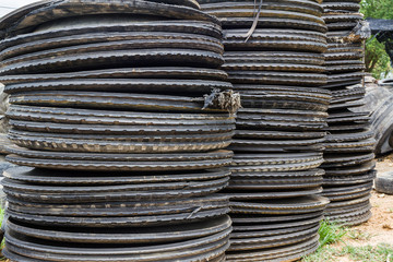 Stack of old wheel black tyre.